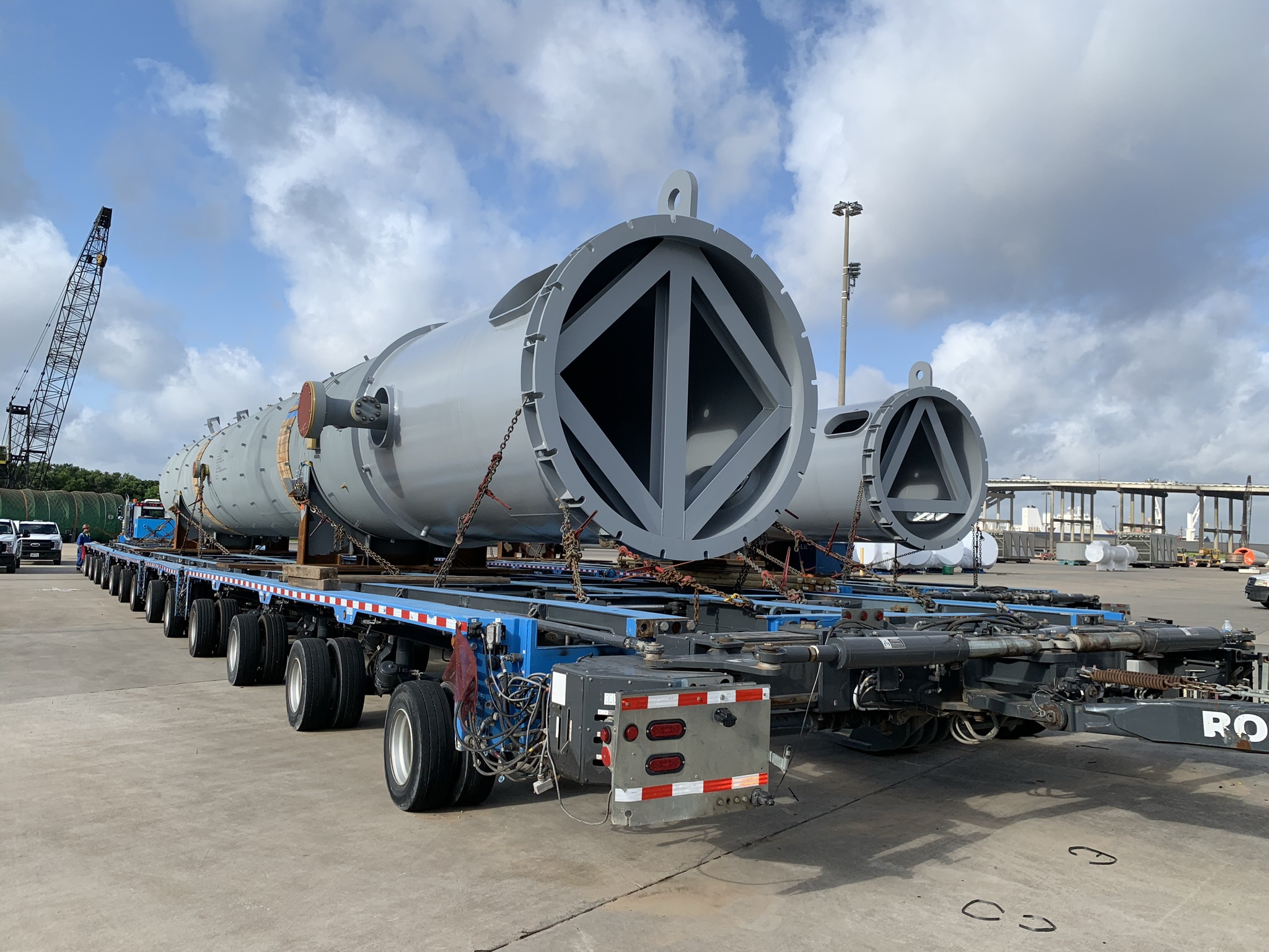 Refinery towers on tow trucks