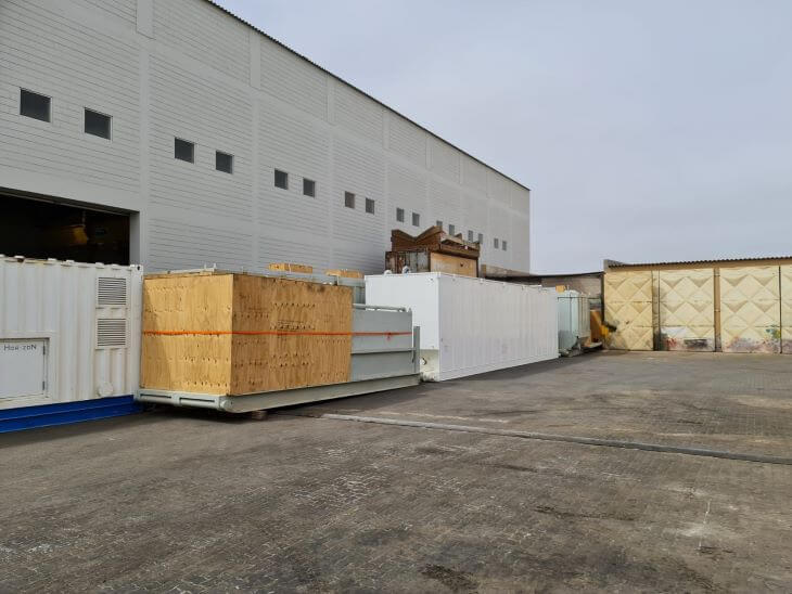 Containers in front of the warehouse