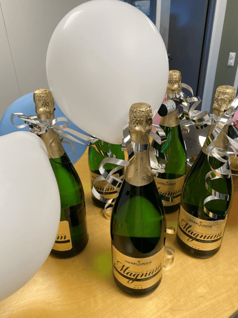 Champagne bottles and balloons