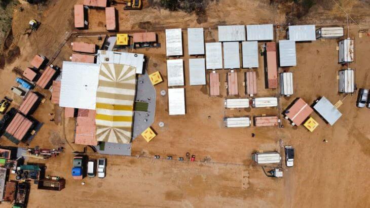 Bird's-eye view to containers and vehicles at a freight yard in Africa