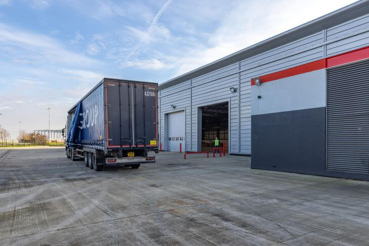 Truck in front of warehouse