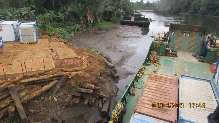 The ship with containers on the river