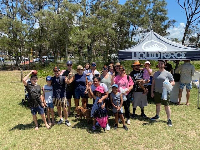 Group of people at an event related to cleaning up green areas in Australia