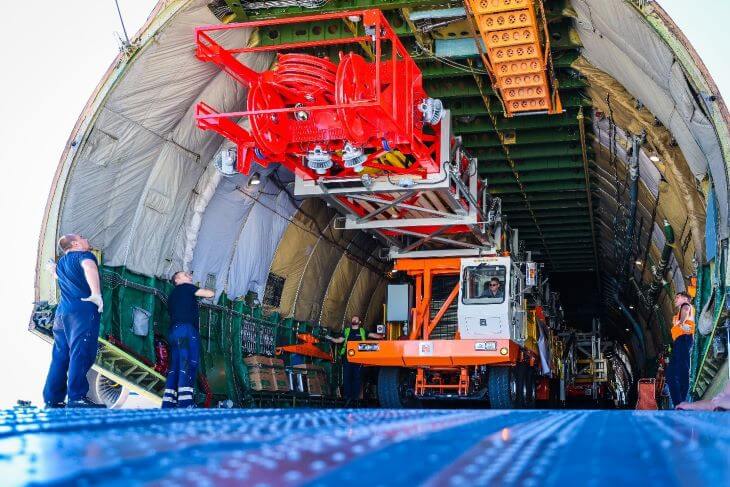 Transportation of the crane to the board of the plane