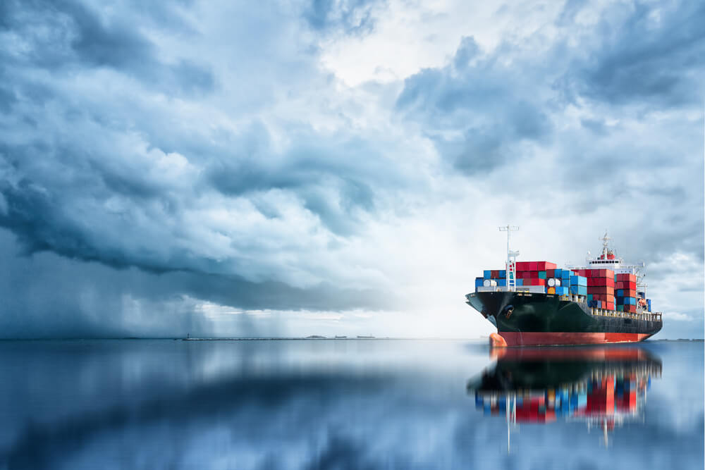 Cargo ship with containers at sea