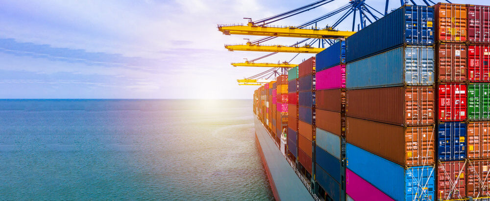 Containers on a cargo ship sailing on the sea