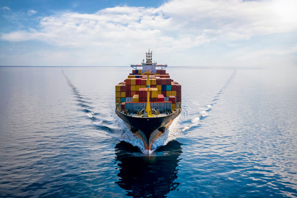 Cargo ship with containers at sea