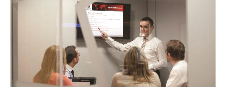 The man shows presentations to a group of people