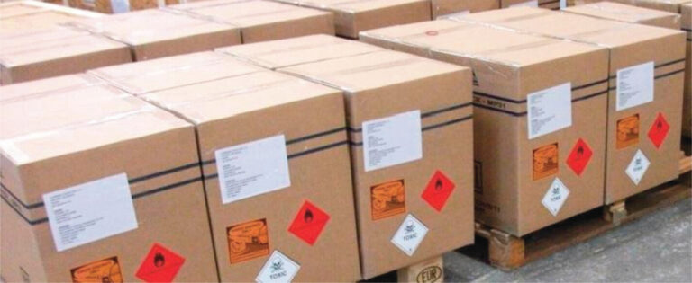 Cardboard boxes marked as dangerous goods